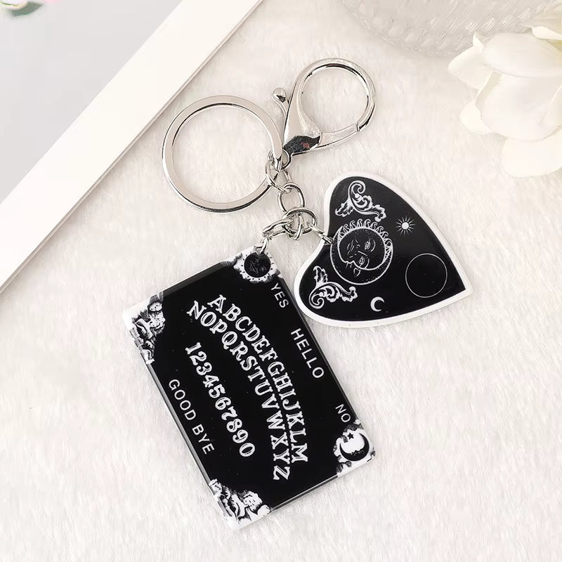 Ouija Planchette Acrylic Keychain with Pompom – Gothic Punk Car Mirror Charm & Handbag Jewelry Accessory