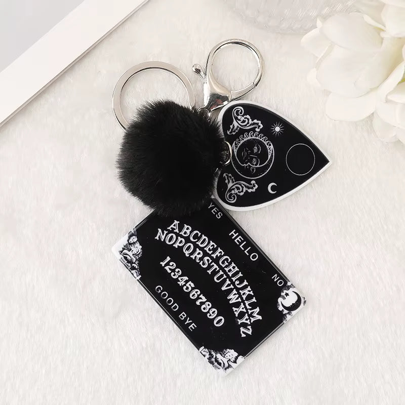 Ouija Planchette Acrylic Keychain with Pompom – Gothic Punk Car Mirror Charm & Handbag Jewelry Accessory